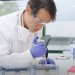 Dr Kevin M. Koo in a research lab. Researchers are hoping to make targeted alpha therapy more precise and effective. 
